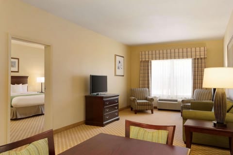 Suite, 1 King Bed, Accessible, Non Smoking (Extended Stay) | Premium bedding, desk, blackout drapes, iron/ironing board
