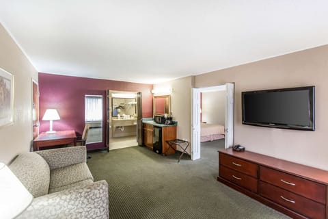 Suite, 1 King Bed, Non Smoking | Blackout drapes, iron/ironing board, free cribs/infant beds