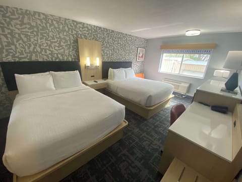 Standard Room, 2 Queen Beds, Non Smoking (Walk-in Shower) | Pillowtop beds, desk, laptop workspace, blackout drapes