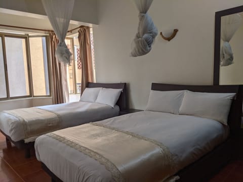 Family Suite, 2 Bedrooms | 1 bedroom, in-room safe, desk, iron/ironing board