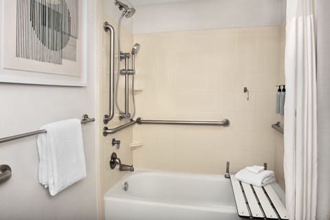 Combined shower/tub, designer toiletries, hair dryer, towels