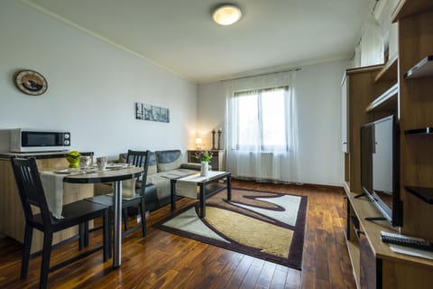 Apartment, 1 Bedroom (22 Elba) | Living area | Flat-screen TV