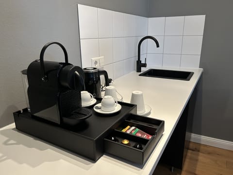 Hypo-allergenic bedding, desk, laptop workspace, iron/ironing board