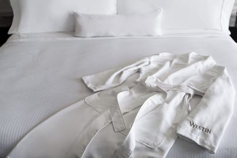 Premium bedding, down comforters, pillowtop beds, in-room safe