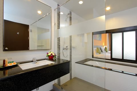 Aqua Pura Room (Pool Access) | Bathroom | Combined shower/tub, deep soaking tub, free toiletries, hair dryer