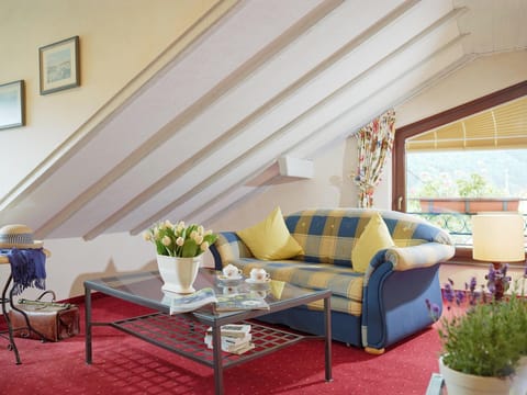 Family Apartment, Balcony or Loggia, approx 65 qm, quiet | Living area | 26-inch flat-screen TV with satellite channels, TV, toys