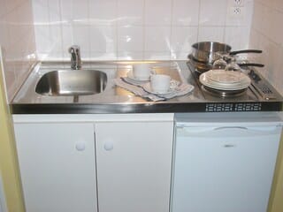 Traditional Double Room | Private kitchenette | Full-size fridge, microwave, stovetop, cookware/dishes/utensils