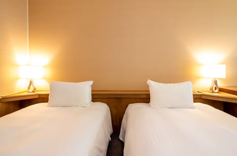 Junior Suite, Non Smoking (4 Single Beds and 1 Sofa Bed) | Premium bedding, down comforters, pillowtop beds, in-room safe