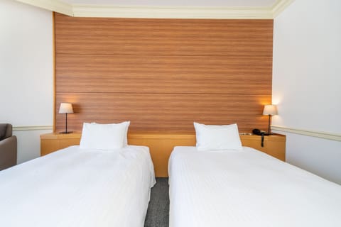 Grand Twin Room, Non Smoking | Premium bedding, down comforters, pillowtop beds, in-room safe