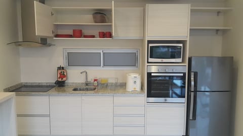 Superior Suite | Private kitchen | Fridge, microwave, oven, stovetop