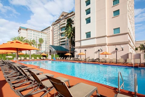 Outdoor pool, pool umbrellas, sun loungers