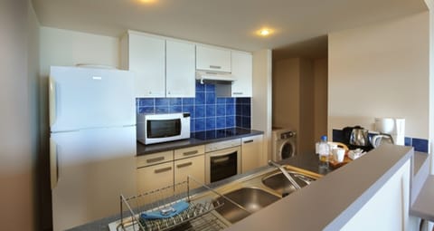 Deluxe Apartment, 3 Bedrooms, Ocean View | Private kitchen | Fridge, microwave, oven, coffee/tea maker