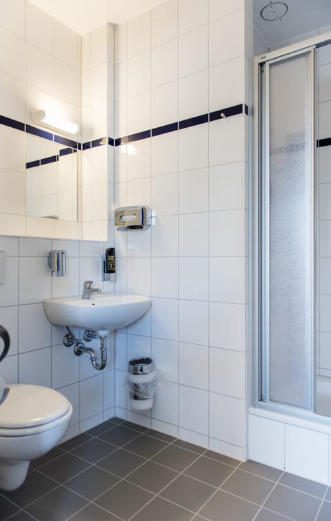 Shower, eco-friendly toiletries, hair dryer, soap