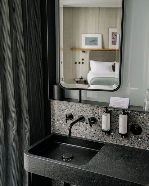 Signature Room | Bathroom | Shower, designer toiletries, hair dryer, bathrobes