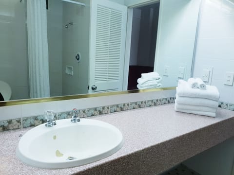 Un-renovated Family Rooms (Ground Floor) | Bathroom | Shower, free toiletries, hair dryer, towels