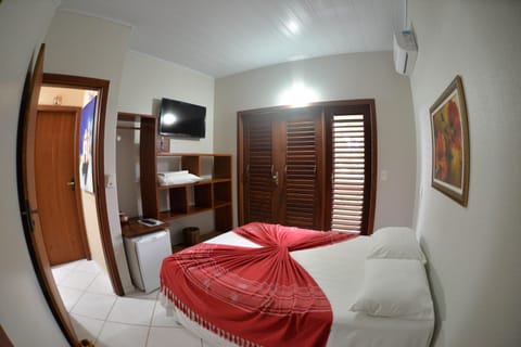 Double Room | Minibar, blackout drapes, iron/ironing board, free WiFi