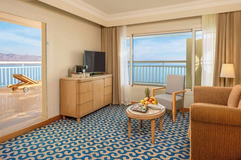 Suite, 1 King Bed (Coral) | Minibar, in-room safe, blackout drapes, iron/ironing board