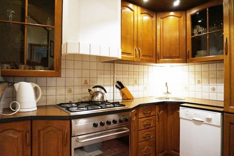 Deluxe Apartment, 1 Bedroom (Swietojanska 7/1) | Private kitchen | Fridge, stovetop, coffee/tea maker, electric kettle