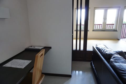 Apartment, 2 Bedrooms | Living room | Flat-screen TV, DVD player