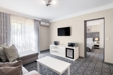 Suite, 2 Bedrooms, Non Smoking | In-room safe, desk, blackout drapes, iron/ironing board