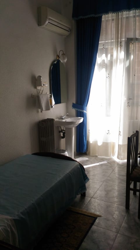 Economy Single Room, Shared Bathroom | Desk, free WiFi, bed sheets