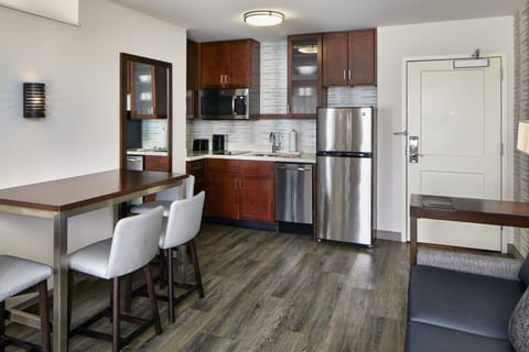 Studio, Multiple Beds | Private kitchen | Full-size fridge, microwave, stovetop, dishwasher