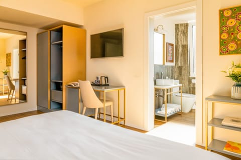 Deluxe Double or Twin Room | Minibar, in-room safe, individually decorated, individually furnished