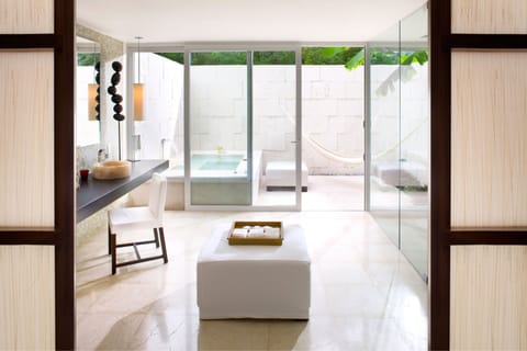 Cenote Lagoon Deluxe Junior Suite | Bathroom | Separate tub and shower, rainfall showerhead, designer toiletries