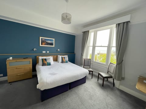 Deluxe Double Room, 1 King Bed, Sea View | Hypo-allergenic bedding, desk, blackout drapes, iron/ironing board