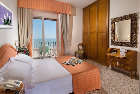 Basic Double or Twin Room, Partial Sea View | In-room safe, desk, free WiFi, bed sheets