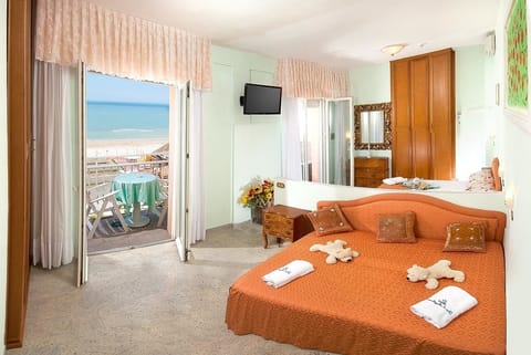 Family Room, Sea View | In-room safe, desk, free WiFi