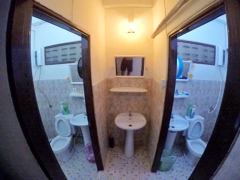 Shared Dormitory | Bathroom | Shower, hair dryer, towels