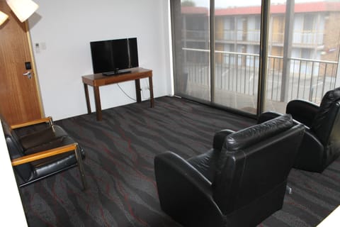 Three Bedroom Apartment | Living area | LED TV, Netflix, streaming services