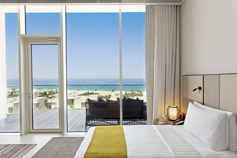 Premier Ocean View Suite with Private Terrace | Minibar, in-room safe, desk, blackout drapes