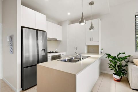 Panoramic Apartment | Private kitchen | Fridge, microwave, oven, stovetop