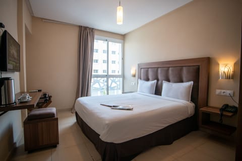 Standard Double Room | In-room safe, laptop workspace, blackout drapes, iron/ironing board