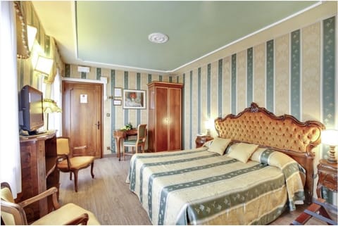 Superior Double Room | Minibar, in-room safe, desk, iron/ironing board