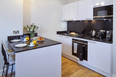 One Bedroom Open Plan Apartment | Private kitchen | Fridge, microwave, oven, stovetop