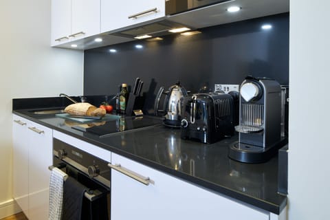 One Bedroom Open Plan Apartment | Private kitchen | Fridge, microwave, oven, stovetop