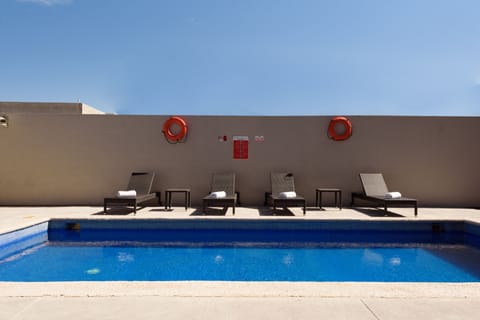Outdoor pool, open 9:00 AM to 8:00 PM, pool umbrellas, sun loungers
