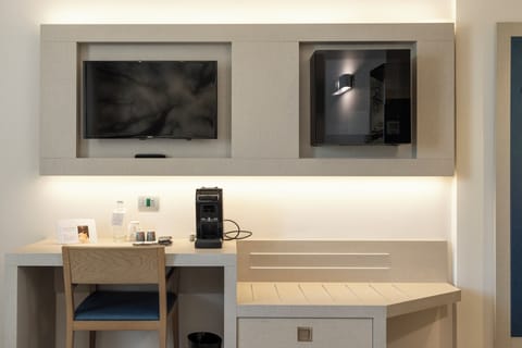 Comfort Room | 1 bedroom, down comforters, minibar, in-room safe