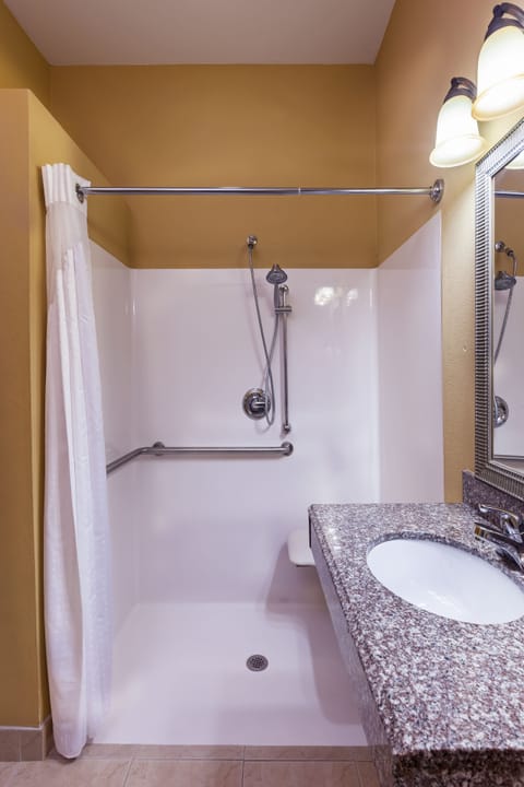 Suite, 2 Queen Beds, Accessible (Mobility Roll-In Shower) | Bathroom | Combined shower/tub, hair dryer, towels