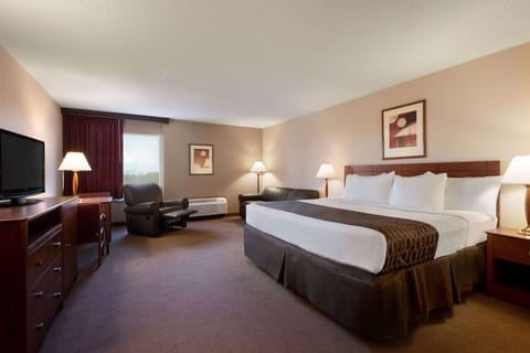 Suite, 1 King Bed, Non Smoking | Premium bedding, in-room safe, blackout drapes, iron/ironing board