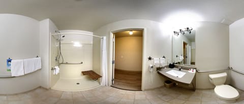 Suite, 1 King Bed, Accessible, Non Smoking (Mobility,Hearing,Roll-In Shower) | Bathroom | Deep soaking tub, free toiletries, hair dryer, towels