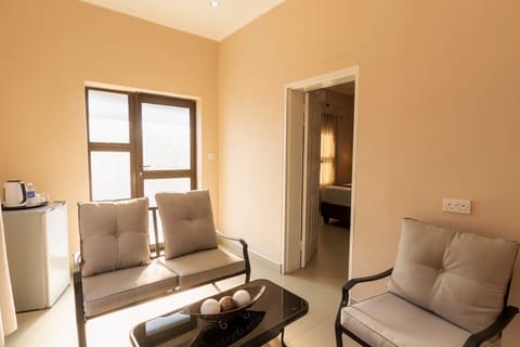 Double Room | Living area | 32-inch LED TV with satellite channels, TV