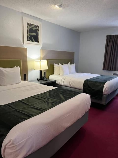 Suite, 2 Queen Beds | Blackout drapes, soundproofing, iron/ironing board, free WiFi