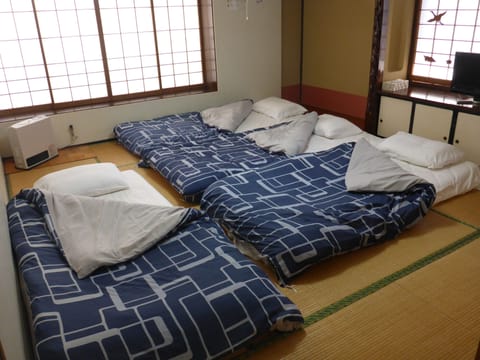 Japanese-Style Quadruple Room with Shared Bathroom | Free WiFi, bed sheets