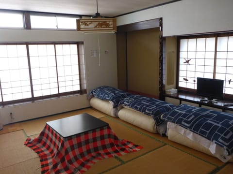 Japanese-Style Quadruple Room with Shared Bathroom | Free WiFi, bed sheets