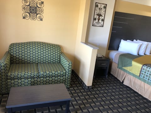 Deluxe Room, 1 King Bed, Non Smoking | Iron/ironing board, free WiFi, bed sheets