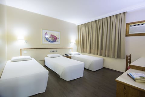 Standard Triple Room | Minibar, in-room safe, free WiFi, bed sheets